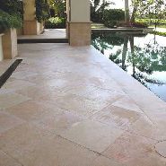 back patio pool area stone tile