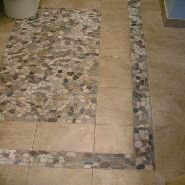 river stone borded floor